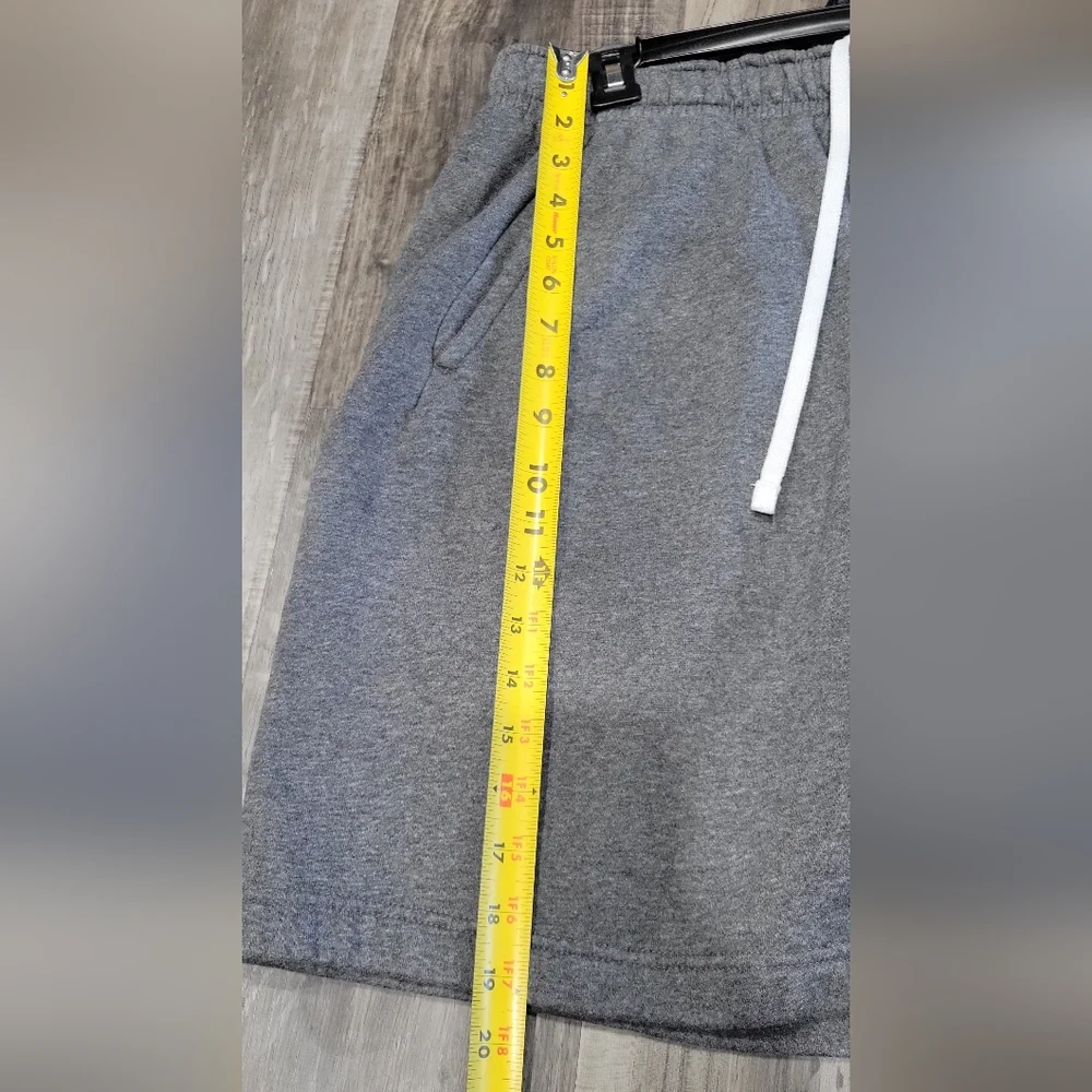 Nike Men's Sportswear Club Fleece Graphic Shorts in gray with a white Swoosh log - Picture 5 of 5